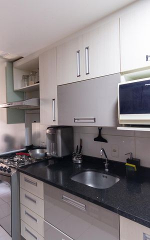 Apartamento à venda com 62m², 2 quartos e 1 vagaCozinha e Área de Serviço