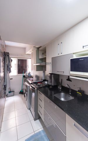 Apartamento à venda com 62m², 2 quartos e 1 vagaCozinha e Área de Serviço