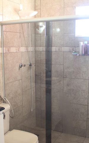Casa à venda com 370m², 4 quartos e 7 vagasBanheiro 2 Casa 2