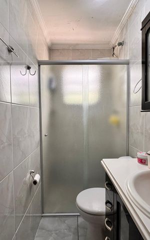 Apartamento à venda com 64m², 2 quartos e 2 vagasBanheiro da suíte