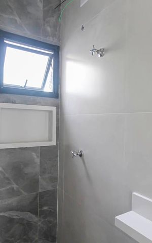 Casa à venda com 107m², 3 quartos e 2 vagas Casa à venda com 107m², 3 quartos e 2 vagasBanheiro