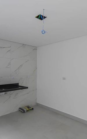 Casa à venda com 107m², 3 quartos e 2 vagas Casa à venda com 107m², 3 quartos e 2 vagasCozinha