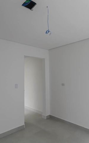 Casa à venda com 107m², 3 quartos e 2 vagas Casa à venda com 107m², 3 quartos e 2 vagasCozinha