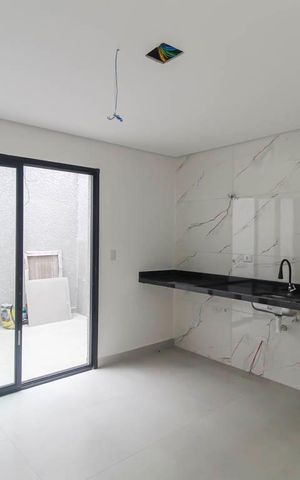 Casa à venda com 107m², 3 quartos e 2 vagas Casa à venda com 107m², 3 quartos e 2 vagasCozinha