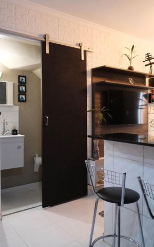 Casa de condomínio para alugar com 57m², 2 quartos e 1 vagaSala/Cozinha