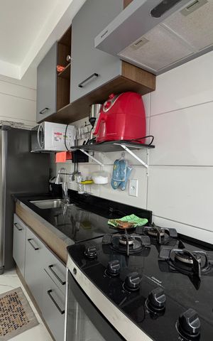 Apartamento à venda com 50m², 2 quartos e 1 vaga Apartamento à venda com 50m², 2 quartos e 1 vagaCozinha e Área de Serviço