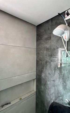 Casa à venda com 230m², 3 quartos e 2 vagas Casa à venda com 230m², 3 quartos e 2 vagasBanheiro da Suíte 1