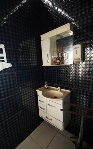 Casa à venda com 62m², 3 quartos e 2 vagasBanheiro de serviço