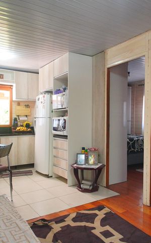 Casa à venda com 65m², 2 quartos e 2 vagasSala