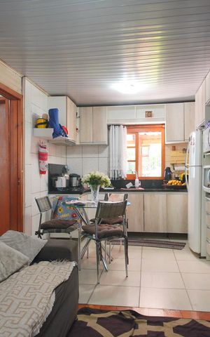 Casa à venda com 65m², 2 quartos e 2 vagasSala