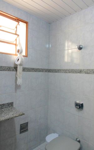 Casa à venda com 281m², 3 quartos e 3 vagasBanheiro