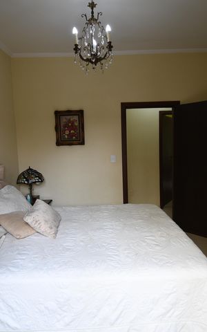 Casa à venda com 282m², 4 quartos e 2 vagasQuarto 4 - Suíte