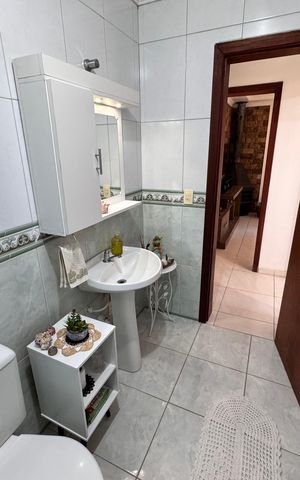 Casa à venda com 159m², 3 quartos e 2 vagas Casa à venda com 159m², 3 quartos e 2 vagasBanheiro