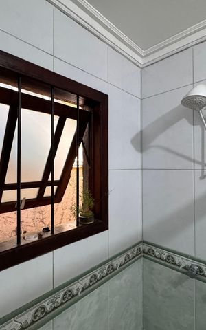 Casa à venda com 159m², 3 quartos e 2 vagas Casa à venda com 159m², 3 quartos e 2 vagasBanheiro
