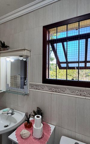 Casa à venda com 159m², 3 quartos e 2 vagas Casa à venda com 159m², 3 quartos e 2 vagasBanheiro