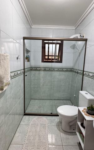 Casa à venda com 159m², 3 quartos e 2 vagas Casa à venda com 159m², 3 quartos e 2 vagasBanheiro