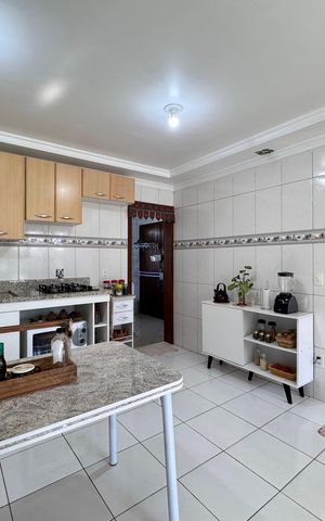 Casa à venda com 159m², 3 quartos e 2 vagas Casa à venda com 159m², 3 quartos e 2 vagasCozinha