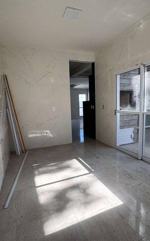 Casa à venda com 129m², 3 quartos e 2 vagas Casa à venda com 129m², 3 quartos e 2 vagasCozinha