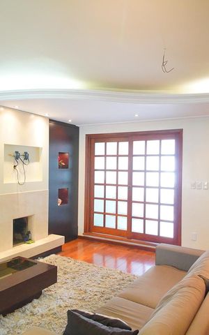 Casa à venda com 313m², 4 quartos e 4 vagasSala de Estar