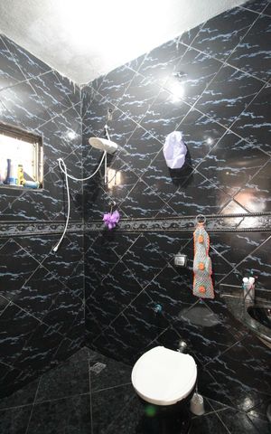 Casa à venda com 95m², 3 quartos e 4 vagasBanheiro da Suite
