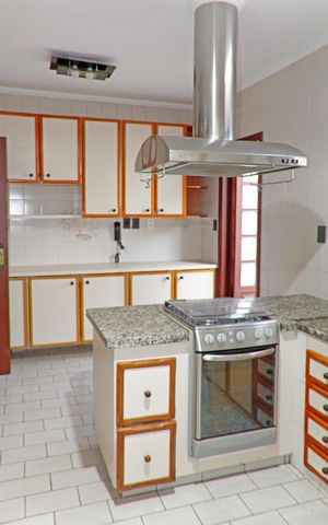 Casa de condomínio para alugar com 399m², 4 quartos e 4 vagasCozinha