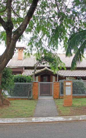 Casa de condomínio para alugar com 399m², 4 quartos e 4 vagasFachada 