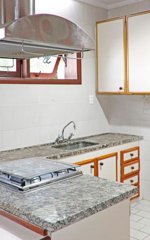 Casa de condomínio para alugar com 399m², 4 quartos e 4 vagasCozinha