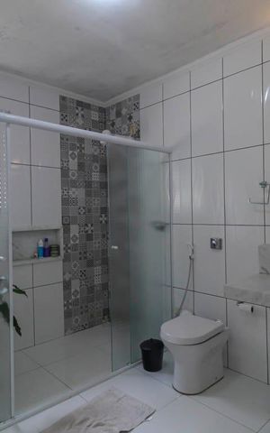 Casa à venda com 240m², 4 quartos e 2 vagas Casa à venda com 240m², 4 quartos e 2 vagasBanheiro da Suíte