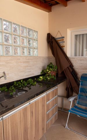 Casa à venda com 210m², 4 quartos e 2 vagas Casa à venda com 210m², 4 quartos e 2 vagasVARANDA/ ÁREA GOURMET
