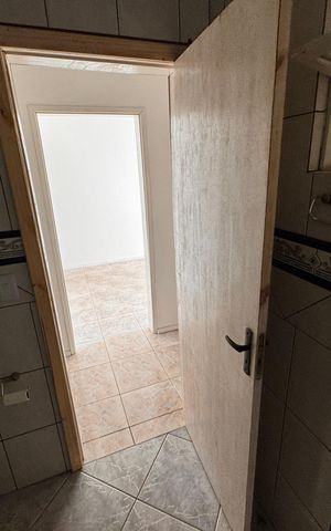 Casa para alugar com 60m², 2 quartos e 2 vagas Casa para alugar com 60m², 2 quartos e 2 vagasCozinha