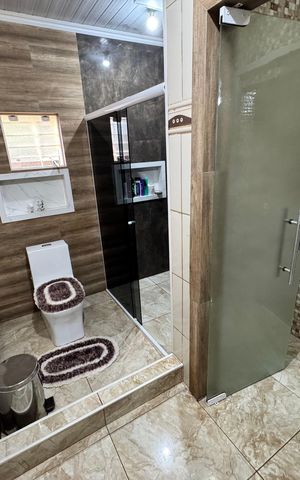 Casa à venda com 110m², 3 quartos e 1 vaga Casa à venda com 110m², 3 quartos e 1 vagaBanheiro da Suíte
