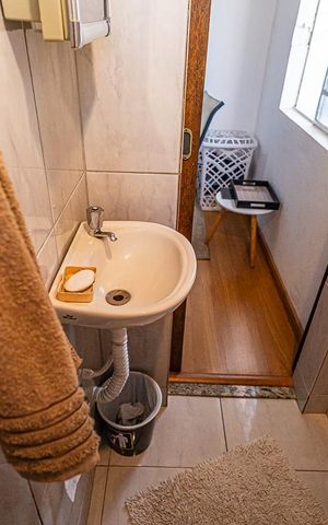Casa à venda com 475m², 4 quartos e 6 vagas Casa à venda com 475m², 4 quartos e 6 vagasBanheiro da Suíte 2