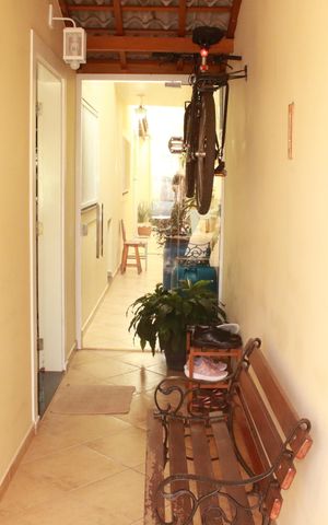 Casa à venda com 115m², 3 quartos e 3 vagasCorredor externo