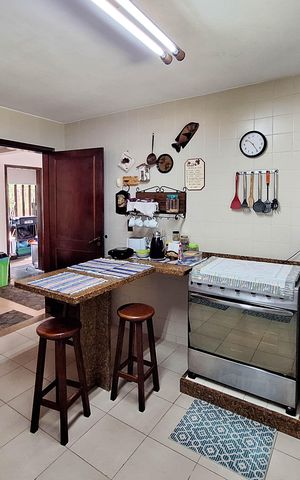 Casa de condomínio à venda com 380m², 4 quartos e 4 vagas Casa de condomínio à venda com 380m², 4 quartos e 4 vagasCozinha