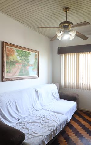 Casa à venda com 165m², 2 quartos e 2 vagasSala de TV