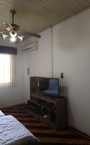 Casa à venda com 165m², 2 quartos e 2 vagasSala de TV