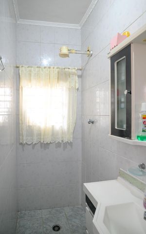Casa à venda com 211m², 4 quartos e 2 vagas Casa à venda com 211m², 4 quartos e 2 vagasBanheiro de Serviço