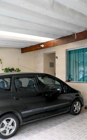 Casa à venda com 211m², 4 quartos e 2 vagas Casa à venda com 211m², 4 quartos e 2 vagasGaragem