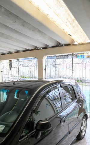 Casa à venda com 211m², 4 quartos e 2 vagas Casa à venda com 211m², 4 quartos e 2 vagasGaragem