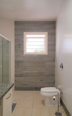Casa à venda com 295m², 3 quartos e 3 vagasBanheiro