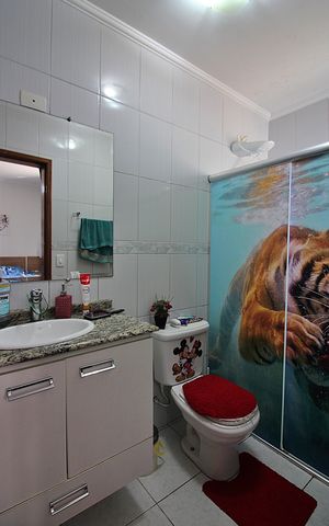 Casa à venda com 216m², 3 quartos e 4 vagasQuarto 1 - Suíte Banheiro