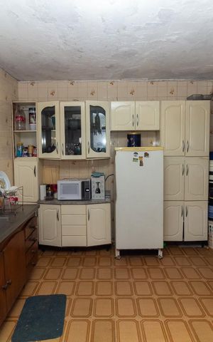 Casa à venda com 170m², 3 quartos e 2 vagas Casa à venda com 170m², 3 quartos e 2 vagasCasa 1 Cozinha