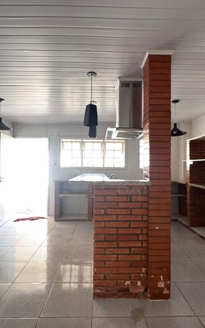 Casa à venda com 262m², 4 quartos e 4 vagas Casa à venda com 262m², 4 quartos e 4 vagasCozinha