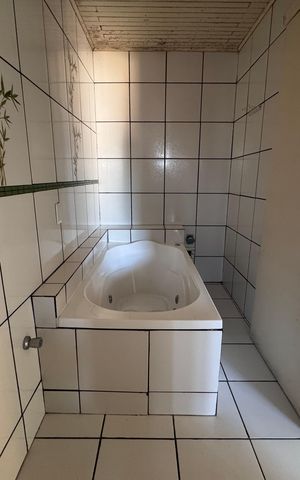 Casa à venda com 262m², 4 quartos e 4 vagas Casa à venda com 262m², 4 quartos e 4 vagasBanheiro Suíte