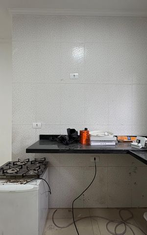 Casa à venda com 173m², 4 quartos e 2 vagas Casa à venda com 173m², 4 quartos e 2 vagasCozinha