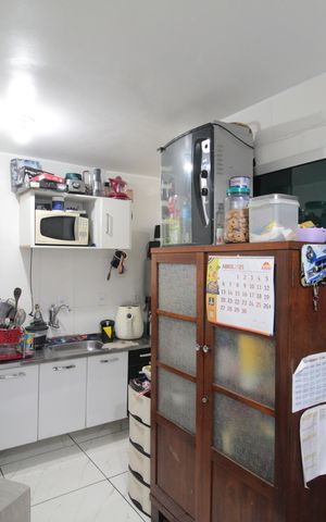 Casa de condomínio à venda com 60m², 2 quartos e 1 vagaCozinha e Área de Serviço