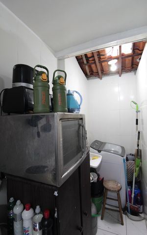 Casa de condomínio à venda com 60m², 2 quartos e 1 vagaCozinha e Área de Serviço