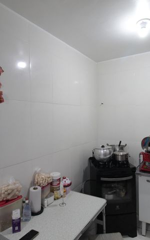 Casa de condomínio à venda com 60m², 2 quartos e 1 vagaCozinha e Área de Serviço