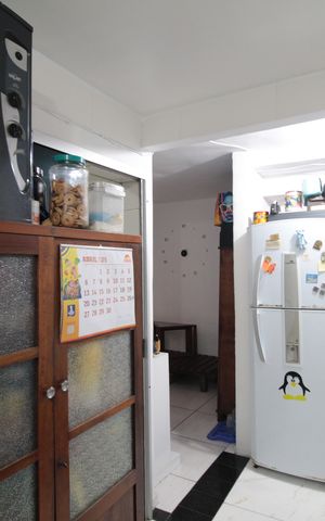 Casa de condomínio à venda com 60m², 2 quartos e 1 vagaCozinha e Área de Serviço