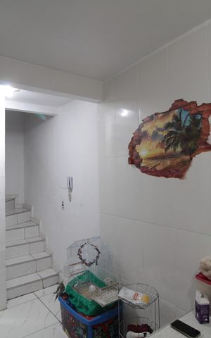 Casa de condomínio à venda com 60m², 2 quartos e 1 vagaCozinha e Área de Serviço